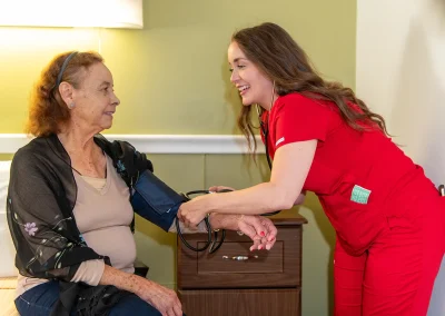 a resident with a caregiver at Los Altos Sub-acute